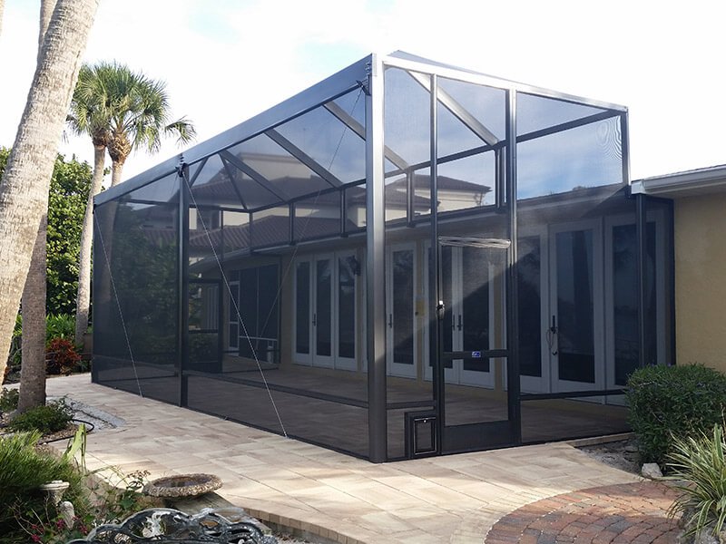 Patio enclosure extension installation in Panama City, FL on residential patio
